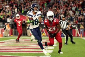 Tyler Lockett scoring a touchdown against the Arizona Cardinals